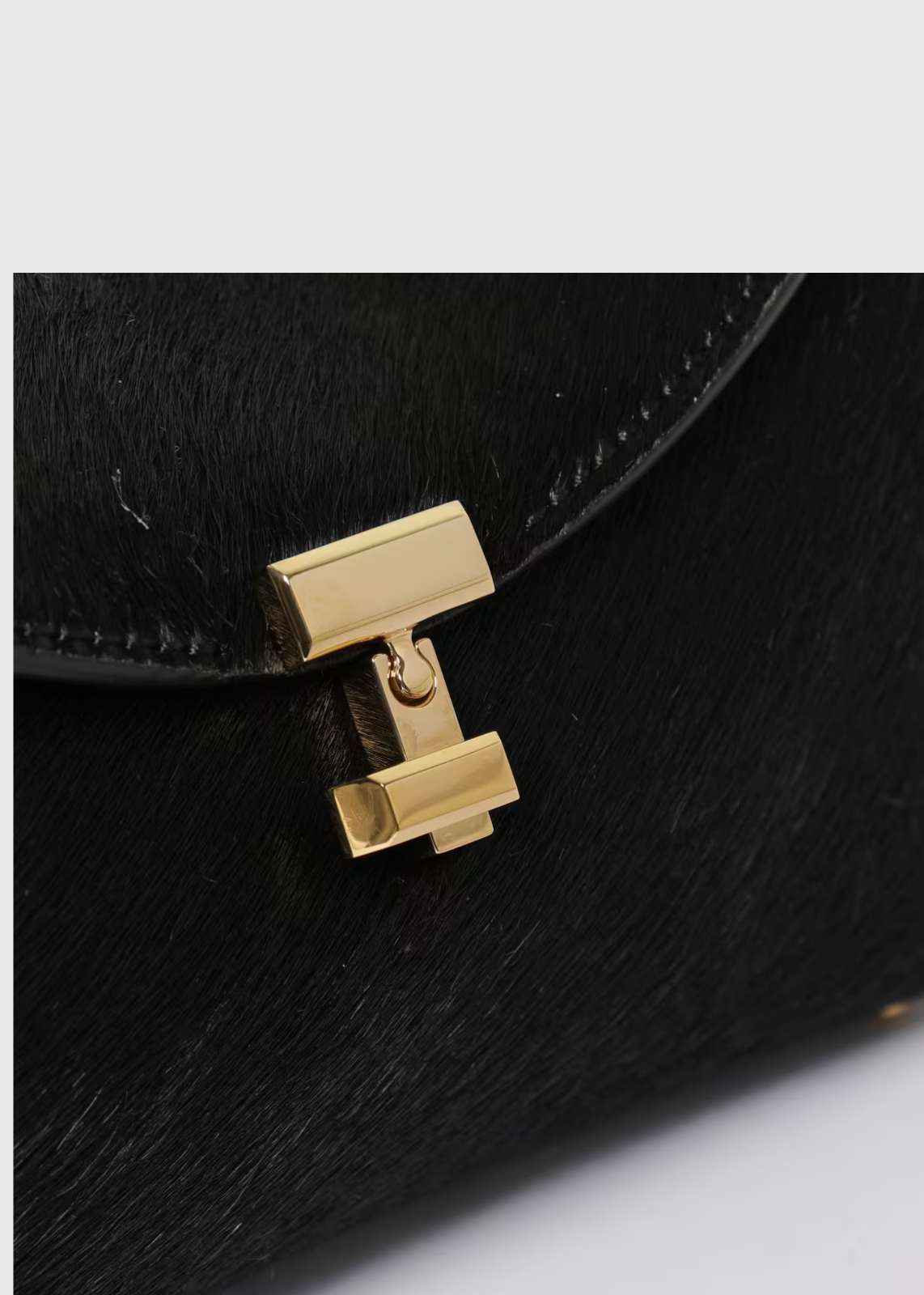 Toteme Mini T-lock Pony Hair Clutch Black