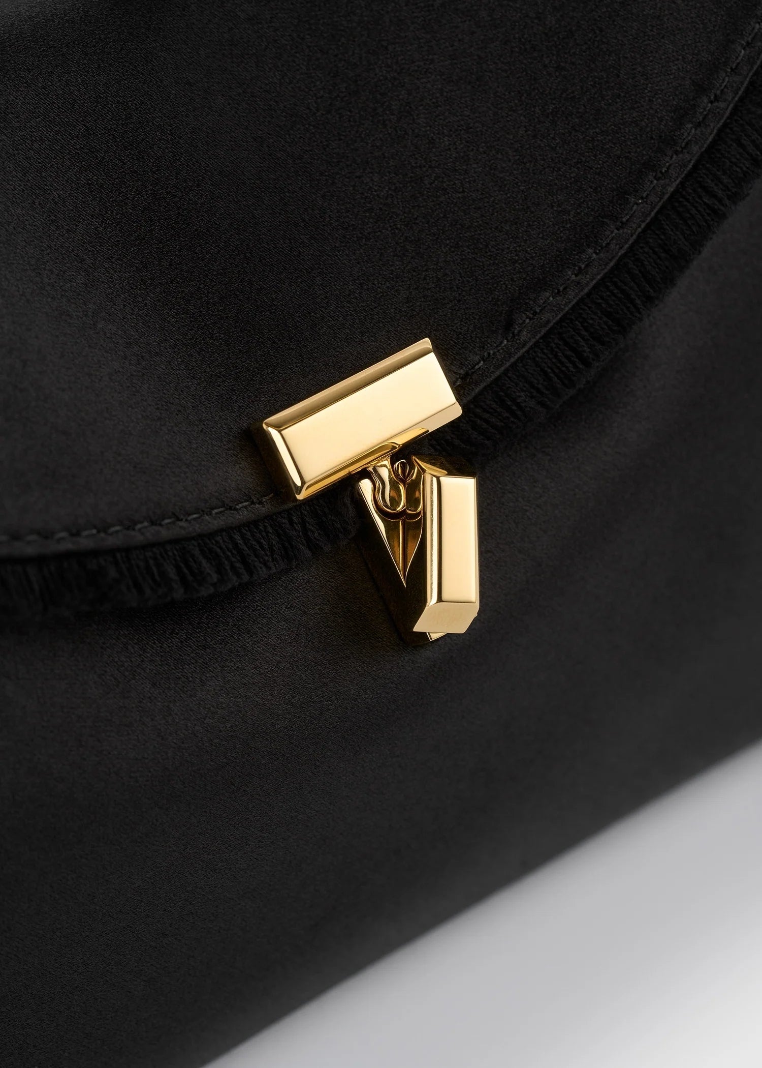 Toteme Mini T-lock Pony Hair Clutch Black