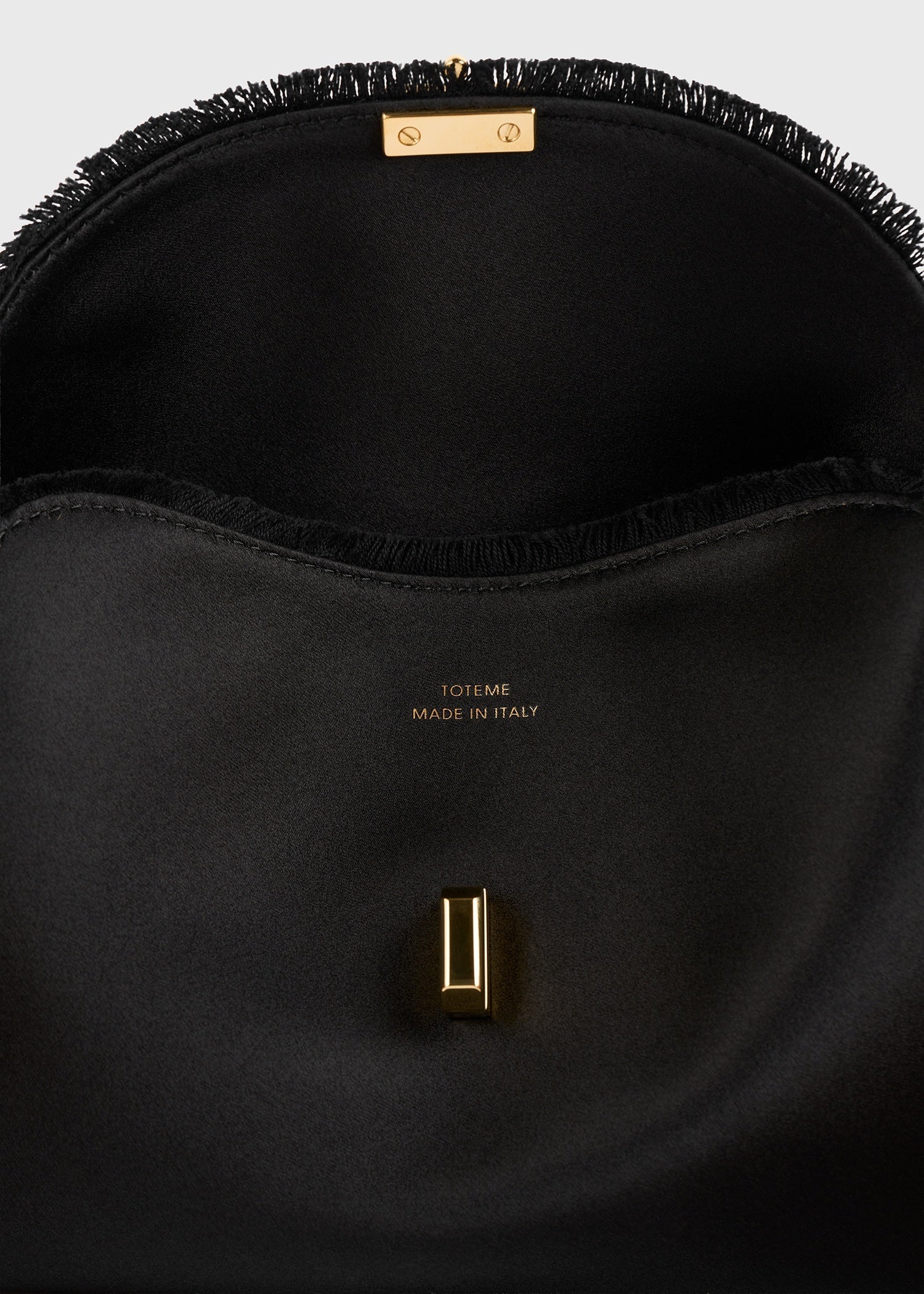 Toteme Mini T-lock Pony Hair Clutch Black