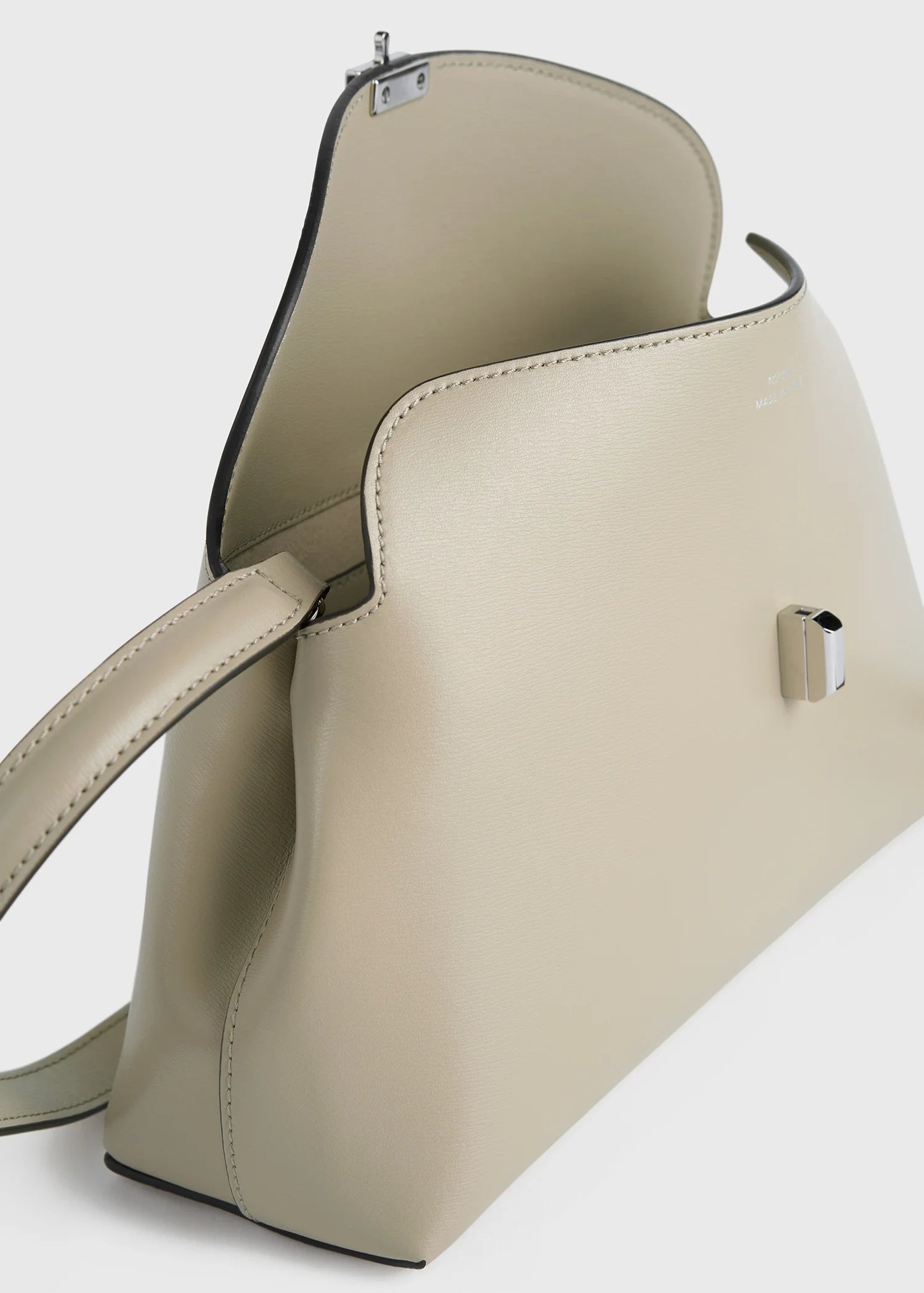 Pochette TOTEME T-Lock en cuir beige